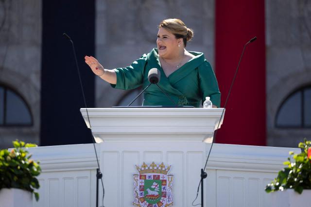 Puerto Rico's newly sworn-in Governor Jennifer Gonzalez delivers her inaugural speech during an outdoor ceremony at the Capitol building in San Juan, Puerto Rico, on January 2, 2025. (Photo by Ricardo ARDUENGO / AFP)