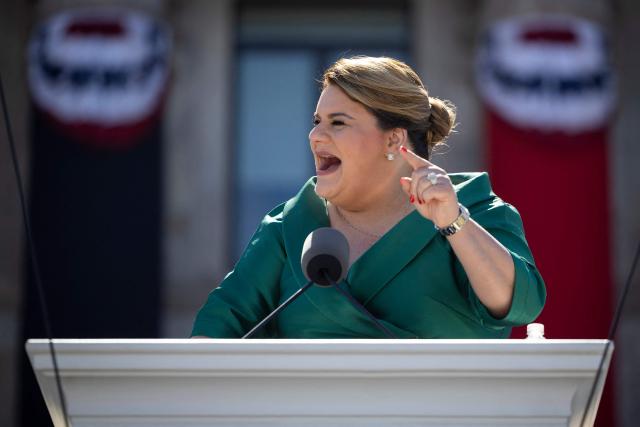 Puerto Rico's newly sworn-in Governor Jennifer Gonzalez delivers her inaugural speech during an outdoor ceremony at the Capitol building in San Juan, Puerto Rico, on January 2, 2025. (Photo by Ricardo ARDUENGO / AFP)