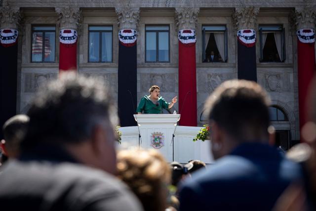 Puerto Rico's newly sworn-in Governor Jennifer Gonzalez delivers her inaugural speech during an outdoor ceremony at the Capitol building in San Juan, Puerto Rico on January 2, 2025. (Photo by Ricardo ARDUENGO / AFP)