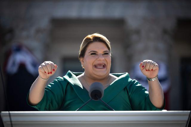 Puerto Rico's newly sworn-in Governor Jennifer Gonzalez delivers her inaugural speech during an outdoor ceremony at the Capitol building in San Juan, Puerto Rico, on January 2, 2025. (Photo by Ricardo ARDUENGO / AFP)