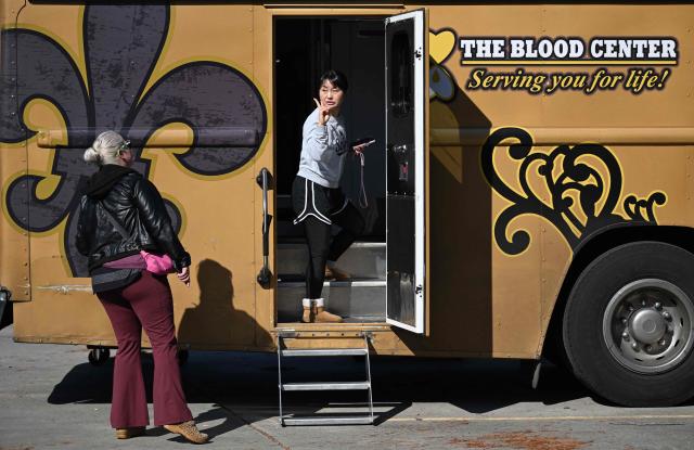 A woman enter a bus donate to donate blood at the Blood Center on January 2, 2025 in New Orleans, Louisiana, following a terrorist attack on January 1. At least 15 people were killed and 30 injured on January 1 when a vehicle plowed overnight into a New Year's crowd in the heart of the thriving New Orleans tourist district, authorities in the southern US city said. (Photo by ANDREW CABALLERO-REYNOLDS / AFP)