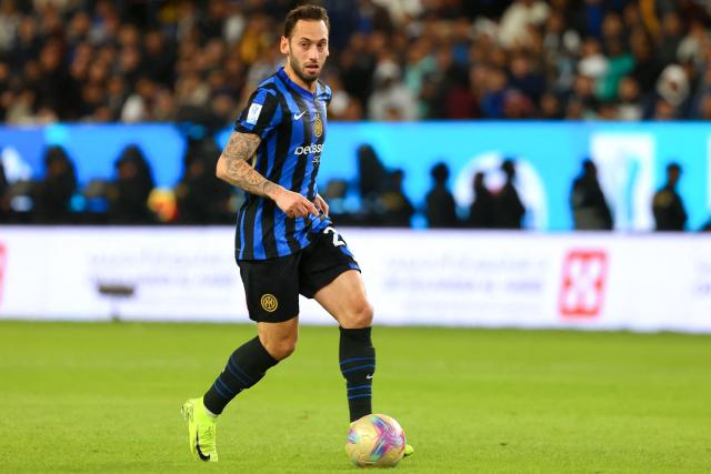 Inter Milan's Turkish midfielder #20 Hakan Calhanoglu runs with the ball during the Italian Super Cup semi-final football match between Inter Milan and Atalanta at the Al-Awwal Park in Riyadh on January 2, 2025. (Photo by Fayez NURELDINE / AFP)