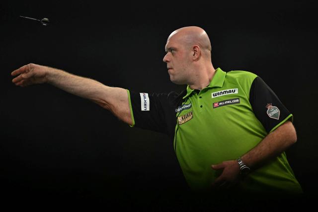 Netherlands' Michael van Gerwen plays against England's Chris Dobey in their PDC World Darts Championship semi- final, at Alexandra Palace in London on January 2, 2025. (Photo by Ben STANSALL / AFP)