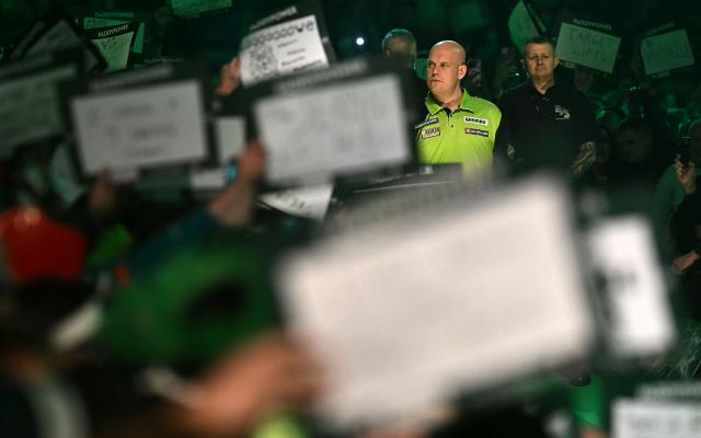 Netherlands' Michael van Gerwen arrives to play against England's Chris Dobey in their PDC World Darts Championship semi- final, at Alexandra Palace in London on January 2, 2025. (Photo by Ben STANSALL / AFP)