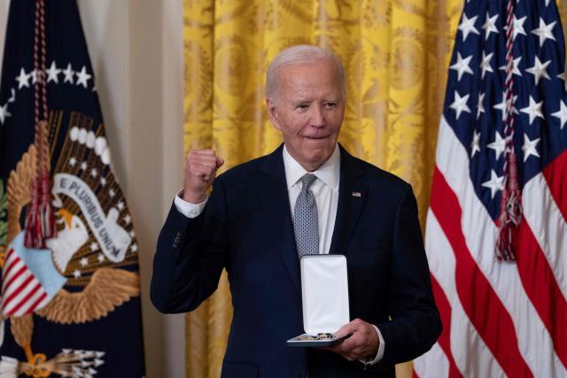 US President Joe Biden presents the Presidential Citizens Medal to Eleanor Smeal during a ceremony at the White House in Washington, DC, on January 2, 2025. (Photo by Chris Kleponis / AFP)