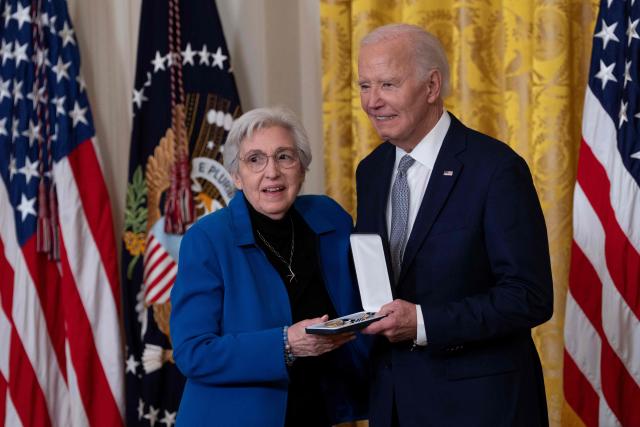 Eleanor Smeal receives the Presidential Citizens Medal from US President Joe Biden during a ceremony at the White House in Washington, DC, on January 2, 2025. (Photo by Chris Kleponis / AFP)