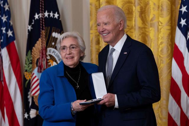 Eleanor Smeal receives the Presidential Citizens Medal from US President Joe Biden during a ceremony at the White House in Washington, DC, on January 2, 2025. (Photo by Chris Kleponis / AFP)