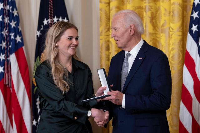 Grace McCarthy receives the Presidential Citizens Medal on behalf of Carolyn McCarthy during a Presidential Citizens Medal ceremony at the White House in Washington, DC, on January 2, 2025. (Photo by Chris Kleponis / AFP)