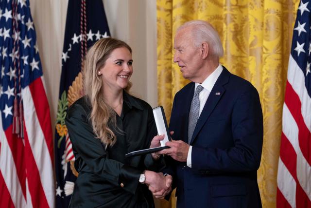 Grace McCarthy receives the Presidential Citizens Medal on behalf of Carolyn McCarthy during a Presidential Citizens Medal ceremony at the White House in Washington, DC, on January 2, 2025. (Photo by Chris Kleponis / AFP)