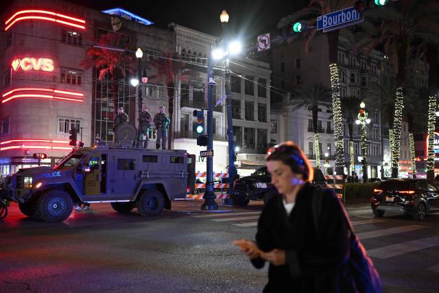 Police stand on a tactical assault vehicle as they monitor the traffic on Bourbon Street on January 2, 2025 in New Orleans, Louisiana, the day after an attack by a man driving a truck down Bourbon street in the French Quarter. A US army veteran loyal to the Islamic State jihadist group likely acted alone when he killed 14 and injured dozens in a truck attack on a crowd of New Year revelers in New Orleans, the FBI said Thursday. Despite initial concerns that Shamsud-Din Jabbar, 42, had accomplices still on the run, preliminary investigations show he likely acted alone, FBI deputy assistant director Christopher Raia said. (Photo by ANDREW CABALLERO-REYNOLDS / AFP)