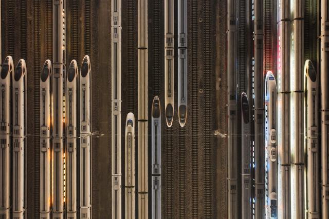 This photo taken on January 2, 2025 shows high-speed trains on stabling tracks in Nanjing, east China's Jiangsu province. China aims to expand the length of its operating high-speed rail tracks to around 60,000 km by 2030, up from 48,000 km at the end of 2024, according to the country's railway operator China State Railway Group Co., Ltd. (China Railway) on January 2nd. (Photo by AFP)