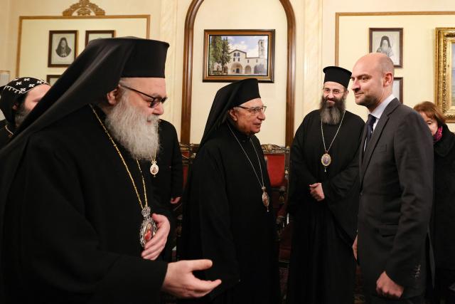 France's Foreign Minister Jean-Noel Barrot (C) meets with Greek Orthodox Patriarch of Antioch and All The East John X in Damascus on January 3, 2025. (Photo by ANWAR AMRO / AFP)