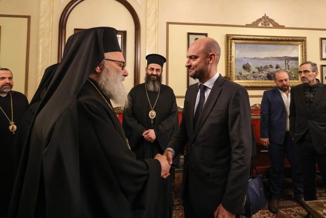 France's Foreign Minister Jean-Noel Barrot (R) is welcomed by Greek Orthodox Patriarchate of Antioch and All The East John X (L), in Damascus on January 3, 2025. (Photo by ANWAR AMRO / AFP)