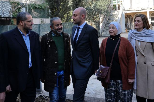 France's Foreign Minister Jean-Noel Barrot (C) visits the French embassy complex in Damascus on January 3, 2025. Barrot expressed his hope on January 3 for a "sovereign, stable and peaceful" Syria as he visited Damascus for talks on behalf of the European Union. (Photo by ANWAR AMRO / AFP)