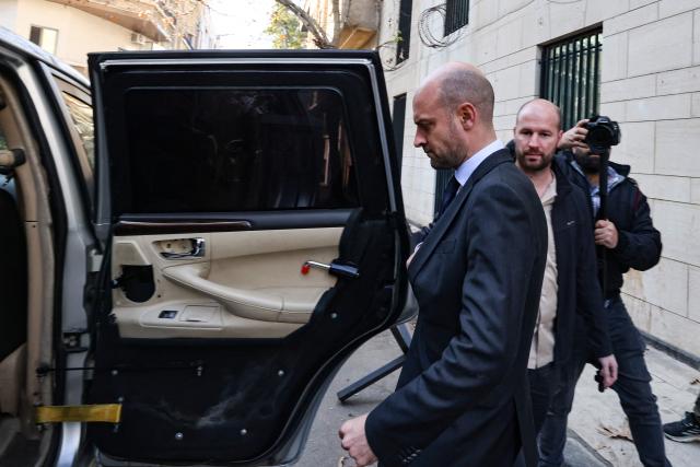 France's Foreign Minister Jean-Noel Barrot leaves the French embassy complex in Damascus on January 3, 2025. Barrot expressed his hope on January 3 for a "sovereign, stable and peaceful" Syria as he visited Damascus for talks on behalf of the European Union. (Photo by ANWAR AMRO / AFP)