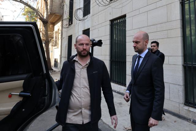 France's Foreign Minister Jean-Noel Barrot leaves the French embassy complex in Damascus on January 3, 2025. Barrot expressed his hope on January 3 for a "sovereign, stable and peaceful" Syria as he visited Damascus for talks on behalf of the European Union. (Photo by ANWAR AMRO / AFP)