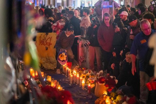 Mourners hold a vigil on Bourbon Street for the victims of the January 1 terrorist attack in New Orleans, Louisiana, on January 4, 2025. At least 15 people were killed and 30 injured on January 1 when a vehicle plowed overnight into a New Year's crowd in the heart of the thriving New Orleans tourist district, authorities in the southern US city said. (Photo by Emily KASK / AFP)