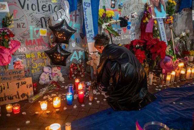 Mourners hold a vigil on Bourbon Street for the victims of the January 1 terrorist attack in New Orleans, Louisiana, on January 4, 2025. At least 15 people were killed and 30 injured on January 1 when a vehicle plowed overnight into a New Year's crowd in the heart of the thriving New Orleans tourist district, authorities in the southern US city said. (Photo by Emily KASK / AFP)