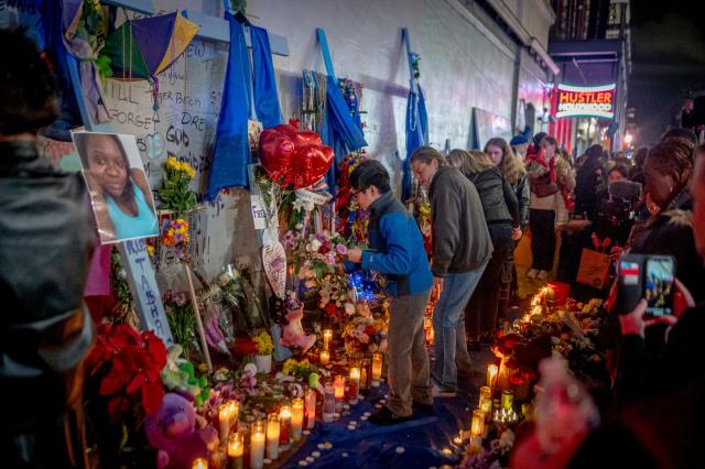 Mourners hold a vigil on Bourbon Street for the victims of the January 1 terrorist attack in New Orleans, Louisiana, on January 4, 2025. At least 15 people were killed and 30 injured on January 1 when a vehicle plowed overnight into a New Year's crowd in the heart of the thriving New Orleans tourist district, authorities in the southern US city said. (Photo by Emily KASK / AFP)