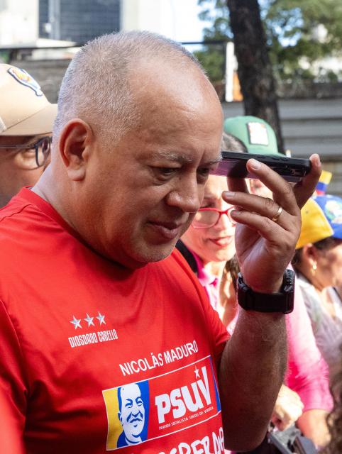 Venezuela's Interior Minister Diosdado Cabello attends a rally in support of President Nicolas Maduro on the eve of the presidential inauguration in Caracas on January 9, 2025. Venezuela is on tenterhooks facing demonstrations called by both the opposition and government supporters a day before President Nicolas Maduro is due to be sworn in for a third consecutive term and despite multiple countries recognizing opposition rival Edmundo Gonzalez Urrutia as the legitimate president-elect following elections past July. (Photo by Betty Laura Zapata / AFP)