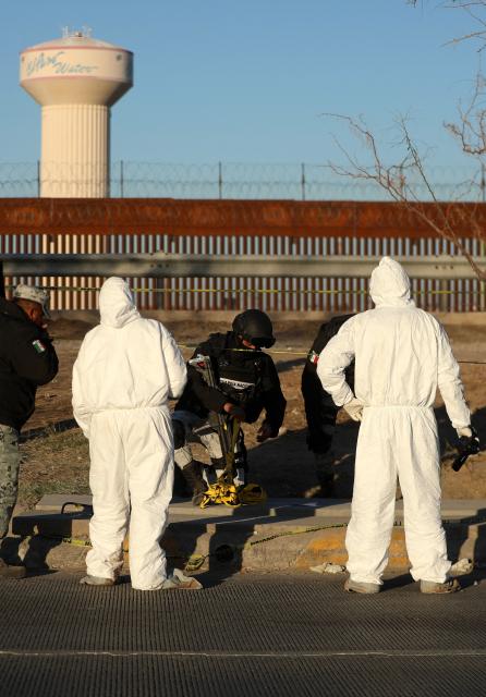 Mexico's Attorney General's Office (FGR) experts and National Guard agents work in the area where a tunnel was found leading to El Paso, Texas, United States, from Ciudad Juarez, Chihuahua State, Mexico, on January 13, 2025. (Photo by Herika Martinez / AFP)