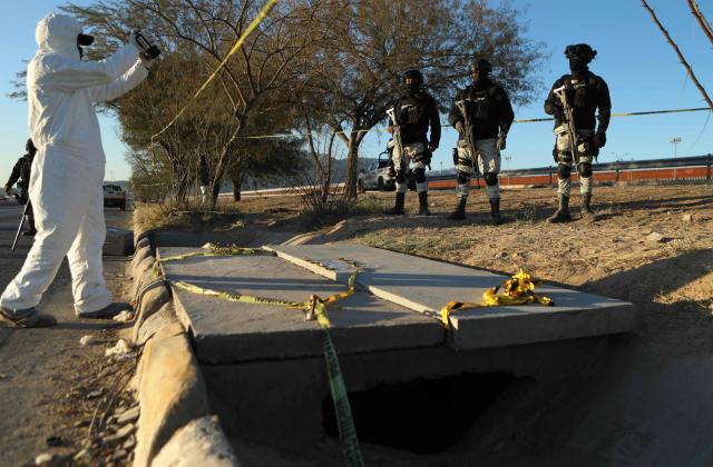 Mexico's Attorney General's Office (FGR) experts and National Guard agents work in the area where a tunnel was found leading to El Paso, Texas, United States, from Ciudad Juarez, Chihuahua State, Mexico, on January 13, 2025. (Photo by Herika Martinez / AFP)