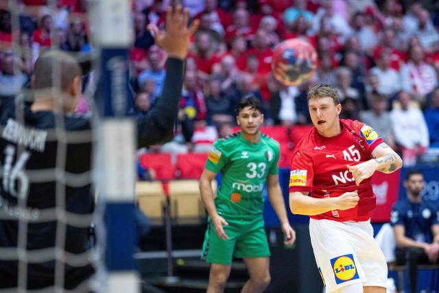 Denmark's Emil Wernsdorf Madsen attempts to score during the Preliminary Round Group B match between Denmark and Algeria of the IHF Men's Handball World Championship in Herning, Denmark on January 14, 2025. (Photo by Bo Amstrup / Ritzau Scanpix / AFP) / Denmark OUT