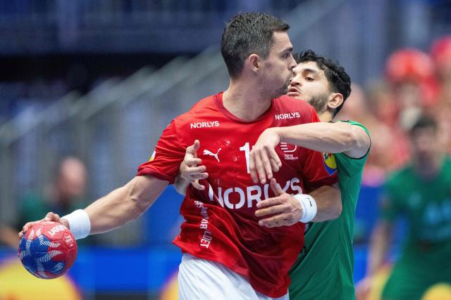 Denmark's Rasmus Lauge Schmidt is seen in action during the Preliminary Round Group B match between Denmark and Algeria of the IHF Men's Handball World Championship in Herning, Denmark on January 14, 2025. (Photo by Bo Amstrup / Ritzau Scanpix / AFP) / Denmark OUT