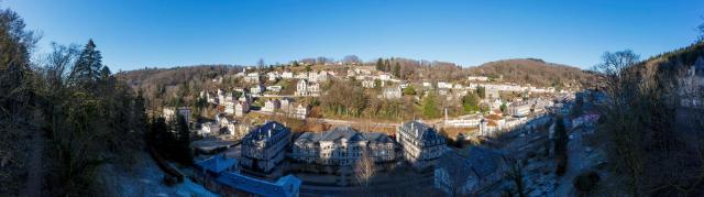 This panoramic photograph shows a general view of the Thermes Napoleon thermal baths (C) and the Grand Hotel (R) in Plombieres-les-Bains, north-eastern France on January 13, 2025. The Bobigny jurisdiction will decide on January 15, 2024 on the future of the thermal baths in Plombieres-les-Bains, managed by the Avec group, which is experiencing financial difficulties. In the center of this small town of 1,600 inhabitants, few businesses are open and the closure of the thermal baths would be a disaster for the local economy. (Photo by Jean-Christophe VERHAEGEN / AFP)