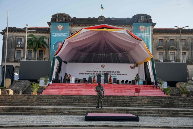 A soldier stands in front of the stage at Independence Square where Mozambique President-elect Daniel Chapo will be sworn into office in Maputo on January 15, 2025. (Photo by PHILL MAGAKOE / AFP)