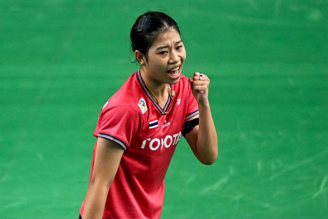 Thailand’s Pornpicha Choeikeewong reacts as she plays against Japan's Tomoka Miyazaki during their women’s singles match at the Yonex-Sunrise India Open 2025 badminton tournament in New Delhi on January 15, 2025. (Photo by Money SHARMA / AFP)