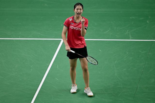 Thailand’s Pornpicha Choeikeewong reacts after winning a point against Japan's Tomoka Miyazaki during their women’s singles match at the Yonex-Sunrise India Open 2025 badminton tournament in New Delhi on January 15, 2025. (Photo by Money SHARMA / AFP)