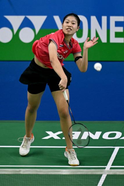 Thailand’s Pornpicha Choeikeewong plays against Japan's Tomoka Miyazaki during their women’s singles match at the Yonex-Sunrise India Open 2025 badminton tournament in New Delhi on January 15, 2025. (Photo by Money SHARMA / AFP)