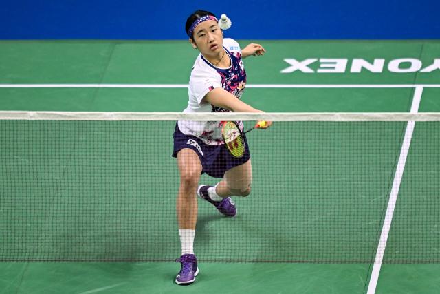 South Korea’s An Se-Young plays against Taiwan's Chiu Pin-Chian during their women’s singles match at the Yonex-Sunrise India Open 2025 badminton tournament in New Delhi on January 15, 2025. (Photo by Money SHARMA / AFP)