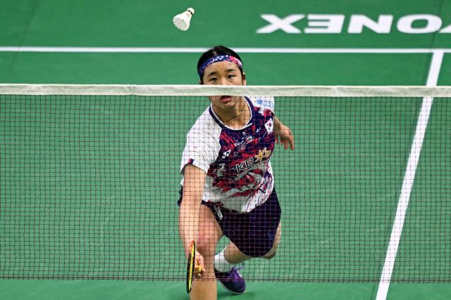 South Korea’s An Se-Young plays against Taiwan's Chiu Pin-Chian during their women’s singles match at the Yonex-Sunrise India Open 2025 badminton tournament in New Delhi on January 15, 2025. (Photo by Money SHARMA / AFP)