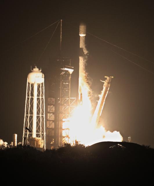 A SpaceX Falcon 9 rocket, carrying Firefly Aerospace's Blue Ghost and ispace's Resilience lunar landers, lifts off from Launch Complex 39A at the Kennedy Space Center in Cape Canaveral, Florida, on January 15, 2025. USA's Firefly and Japan's ispace aim to build on the success of Texas-based Intuitive Machines, which last year became the first company to successfully touch down on Earth's celestial neighbor. (Photo by Gregg Newton / Gregg Newton / AFP)