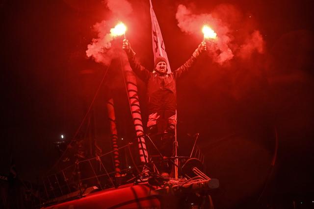 French skipper Yoann Richomme, on his Imoca 60 monohull Paprec Arkea, enters the channel to finish in second place in the 10th edition of the Vendee Globe around the world monohull solo sailing race in Les Sables-d'Olonne, western France, on January 15, 2025. (Photo by Sebastien Salom-Gomis / AFP)