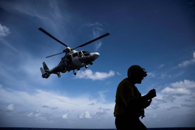 A Eurocopter AS565 Panther military helicopter takes off from the French surveillance frigate FS Ventose for a medical evacuation mission as the ship sails on a mission off French Caribbean island of Martinique, on November 14, 2024. The French surveillance frigate FS Ventose is deployed at sea on a Narcops mission to intercept narco-traffickers' vessels potentially transporting narcotics, as part of the fight against drug trafficking in the French West Indies. (Photo by JULIEN DE ROSA / AFP)