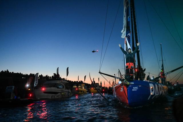 French skipper Yoann Richomme, on his Imoca 60 monohull Paprec Arkea, enters the channel to finish in second place in the 10th edition of the Vendee Globe around the world monohull solo sailing race in Les Sables-d'Olonne, western France, on January 15, 2025. (Photo by Sebastien Salom-Gomis / AFP)