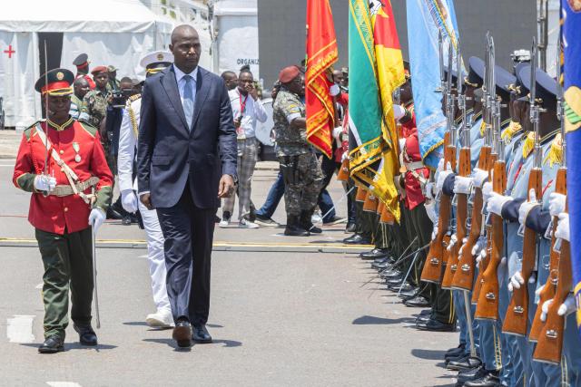 Mozambique President Daniel Chapo (2nd L) inspects the guard of honour during his inauguration at Independence Square in Maputo on January 15, 2025. Mozambique swore in Daniel Chapo as president on January 15, 2025 following months of post-election violence that an NGO says has killed more than 300 people.
Vowing "to devote all my energies to defending, promoting and consolidating national unity", Chapo, 48, extends his Frelimo party's 50-year rule of the gas-rich African nation. Opposition candidate Venancio Mondlane claims that the October 2024 election was rigged. (Photo by ALFREDO ZUNIGA / AFP)