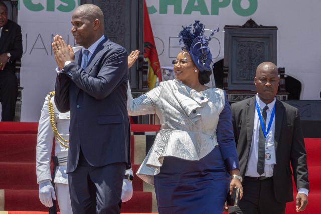 Mozambique President Daniel Chapo (L) and Mozambique First Lady Gueta Chapo (2nd R) wave at attendees during his inauguration at Independence Square in Maputo on January 15, 2025. Mozambique swore in Daniel Chapo as president on January 15, 2025 following months of post-election violence that an NGO says has killed more than 300 people.
Vowing "to devote all my energies to defending, promoting and consolidating national unity", Chapo, 48, extends his Frelimo party's 50-year rule of the gas-rich African nation. Opposition candidate Venancio Mondlane claims that the October 2024 election was rigged. (Photo by ALFREDO ZUNIGA / AFP)