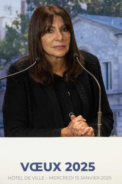 The Mayor of Paris Anne Hidalgo gives an address during her New Year's wishes, at the Hotel de Ville (city hall), in Paris on January 15, 2025. (Photo by Martin LELIEVRE / AFP)