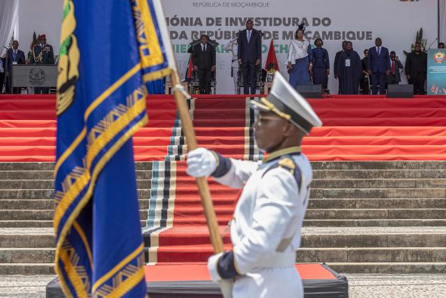 TOPSHOT - Mozambique President-elect Daniel Chapo (CR) and outgoing Mozambique President Filipe Nyusi (CL) look on during his inauguration at Independence Square in Maputo on January 15, 2025. Mozambique swore in Daniel Chapo as president on January 15, 2025 following months of post-election violence that an NGO says has killed more than 300 people.
Vowing "to devote all my energies to defending, promoting and consolidating national unity", Chapo, 48, extends his Frelimo party's 50-year rule of the gas-rich African nation. Opposition candidate Venancio Mondlane claims that the October 2024 election was rigged. (Photo by ALFREDO ZUNIGA / AFP)