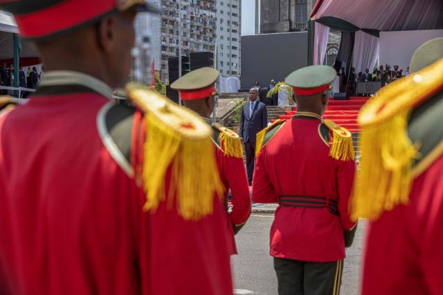 Mozambique President Daniel Chapo (C) inspects the guard of honour during his inauguration at Independence Square in Maputo on January 15, 2025. Mozambique swore in Daniel Chapo as president on January 15, 2025 following months of post-election violence that an NGO says has killed more than 300 people.
Vowing "to devote all my energies to defending, promoting and consolidating national unity", Chapo, 48, extends his Frelimo party's 50-year rule of the gas-rich African nation. Opposition candidate Venancio Mondlane claims that the October 2024 election was rigged. (Photo by ALFREDO ZUNIGA / AFP)