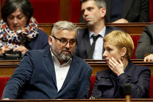 French leftist MPs Clementine Autain (R) and Alexis Corbiere (L) discuss during a session of questions to the government at the National Assembly, French Parliament lower house, in Paris on January 15, 2025. (Photo by Thibaud MORITZ / AFP)