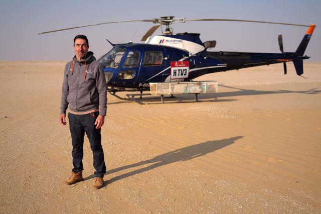 Former alpine skier and race car driver Luc Alphand poses during Stage 10 of the Dakar Rally 2025, between Haradh and Shubaytah, Saudi Arabia, on January 15, 2025. (Photo by Valery HACHE / AFP)