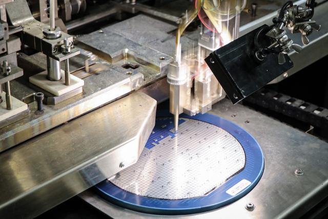 A semiconductor wafer is seen under process at a factory in Binzhou, in eastern China's Shandong province on January 15, 2025. (Photo by AFP) / China OUT