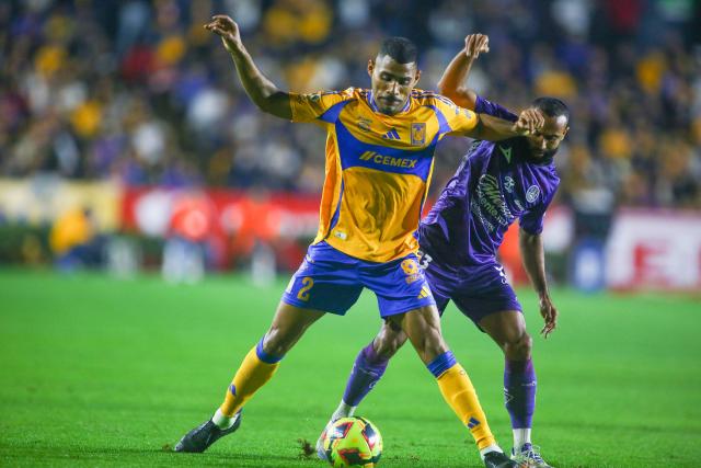 Tigres' Brazilian defender #02 Joaquim Henrique and Mazatlan's Ecuadorian midfielder #23 Jordan Sierra fight for the ball during the Liga MX Clausura football match between Tigres and Mazatlan at the Universitario (UANL) Stadium in San Nicolas de los Garza, Nuevo Leon State, Mexico on January 17, 2025. (Photo by Julio Cesar AGUILAR / AFP)