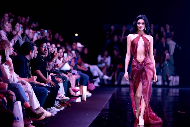 A model presents a creation by “Casa Jaguar Swim” during the 82nd edition of Intermoda in Guadalajara, Jalisco state, Mexico, on January 21, 2025. (Photo by ULISES RUIZ / AFP)