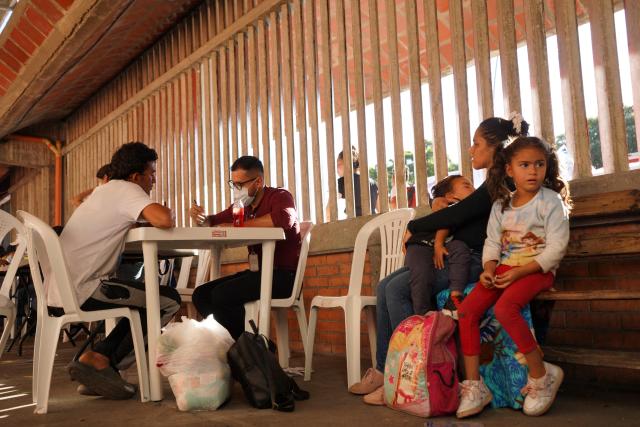 Displaced people from recent clashes between armed leftist groups are assisted at General Santander Stadium in Cucuta, Norte de Santander province, Colombia, on January 21, 2025. Colombian special forces edged into guerrilla-controlled territory near the border with Venezuela Tuesday, trying to reassert state control amid violence that has forced 20,000 people to flee their homes. (Photo by YEISON PICON / AFP)